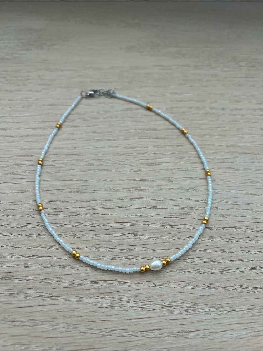 Handmade Blue Seed Bead Necklace with Gold Accents and Pearl
